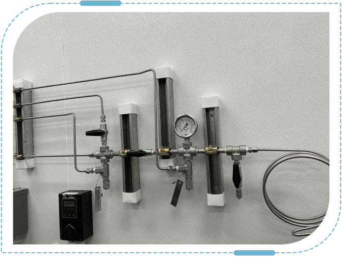 Wall-mounted industrial valves and pipes