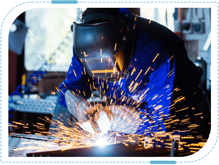 Welder working with bright sparks flying