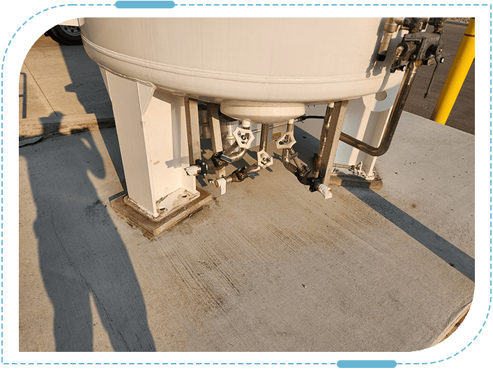 Shadow cast on concrete near tank